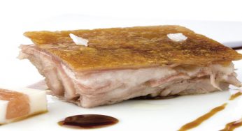 Cochinillo confitado con terrina de ajos y membrillo