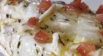 Lubina al horno con vinagreta de tomate